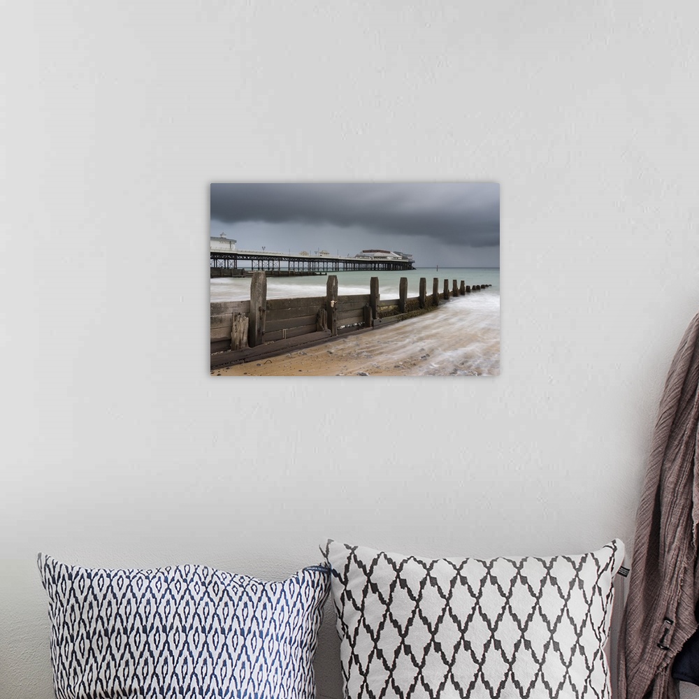 A bohemian room featuring A stormy sky over the beach and pier at Cromer, Norfolk, England