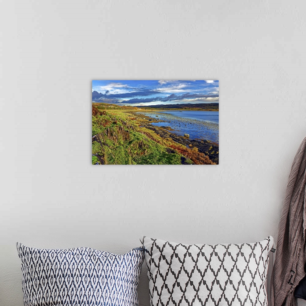 A bohemian room featuring A view across the remote Loch Na Cille at low tide in the Scottish Highlands, Scotland, United Ki...
