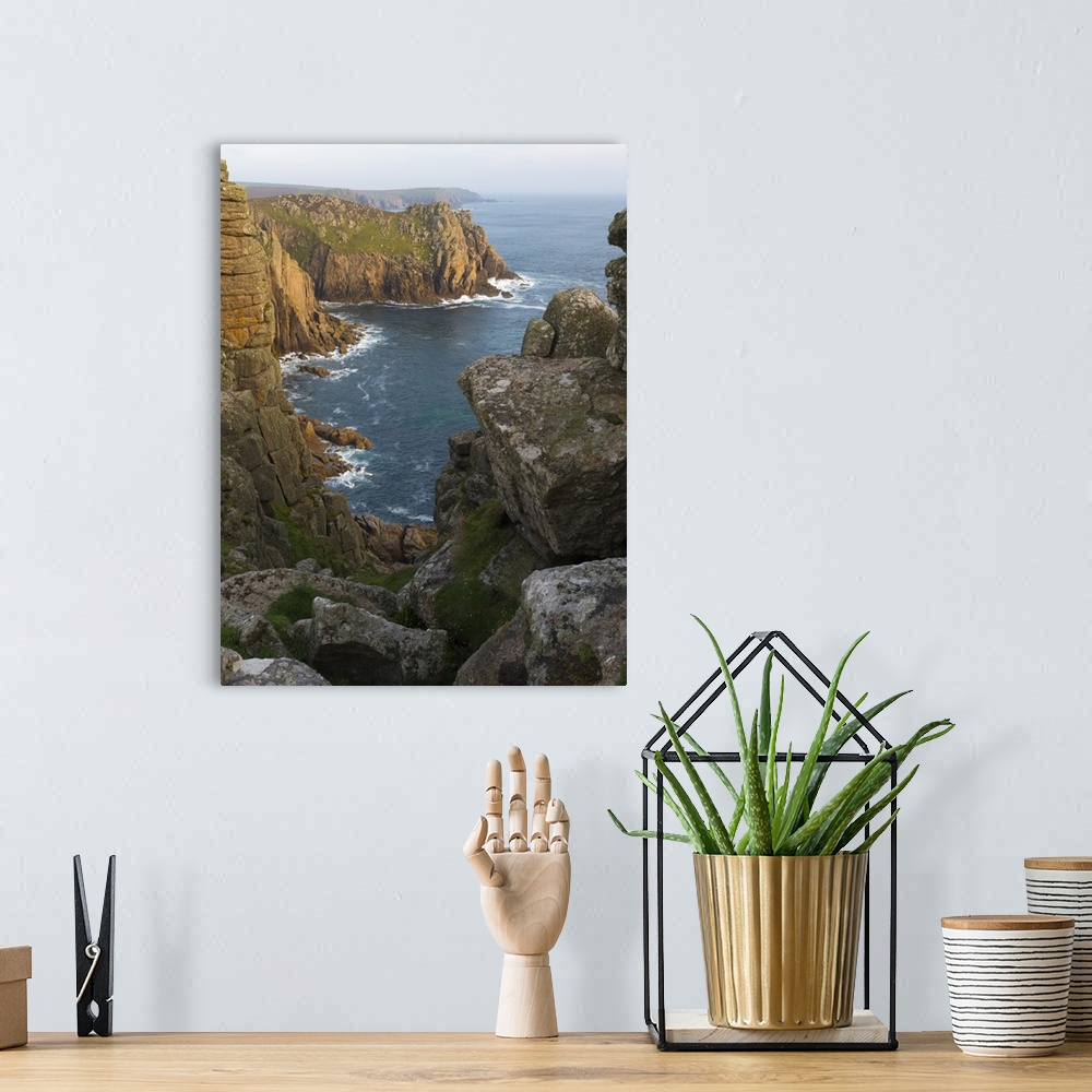 A bohemian room featuring A view of Pordenack Point at Lands End, Cornwall, England