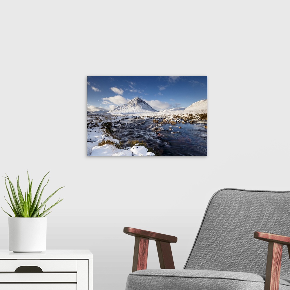 A modern room featuring A wintery scene at Buachaille Etive Mor and River Coupall, Glencoe, Highlands, Scotland, United K...