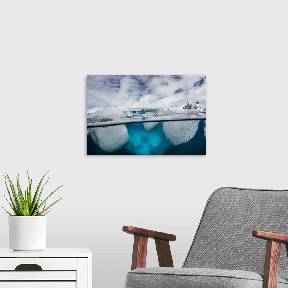 A modern room featuring Above and below water view of Danco Island, Errera Channel, Antarctica, Polar Regions