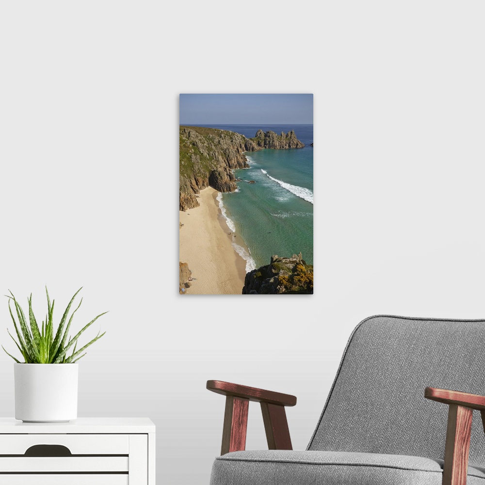 A modern room featuring Iconic view from Treen cliffs, across the sands of Pedn Vaunder to the Logan Rock headland, near ...