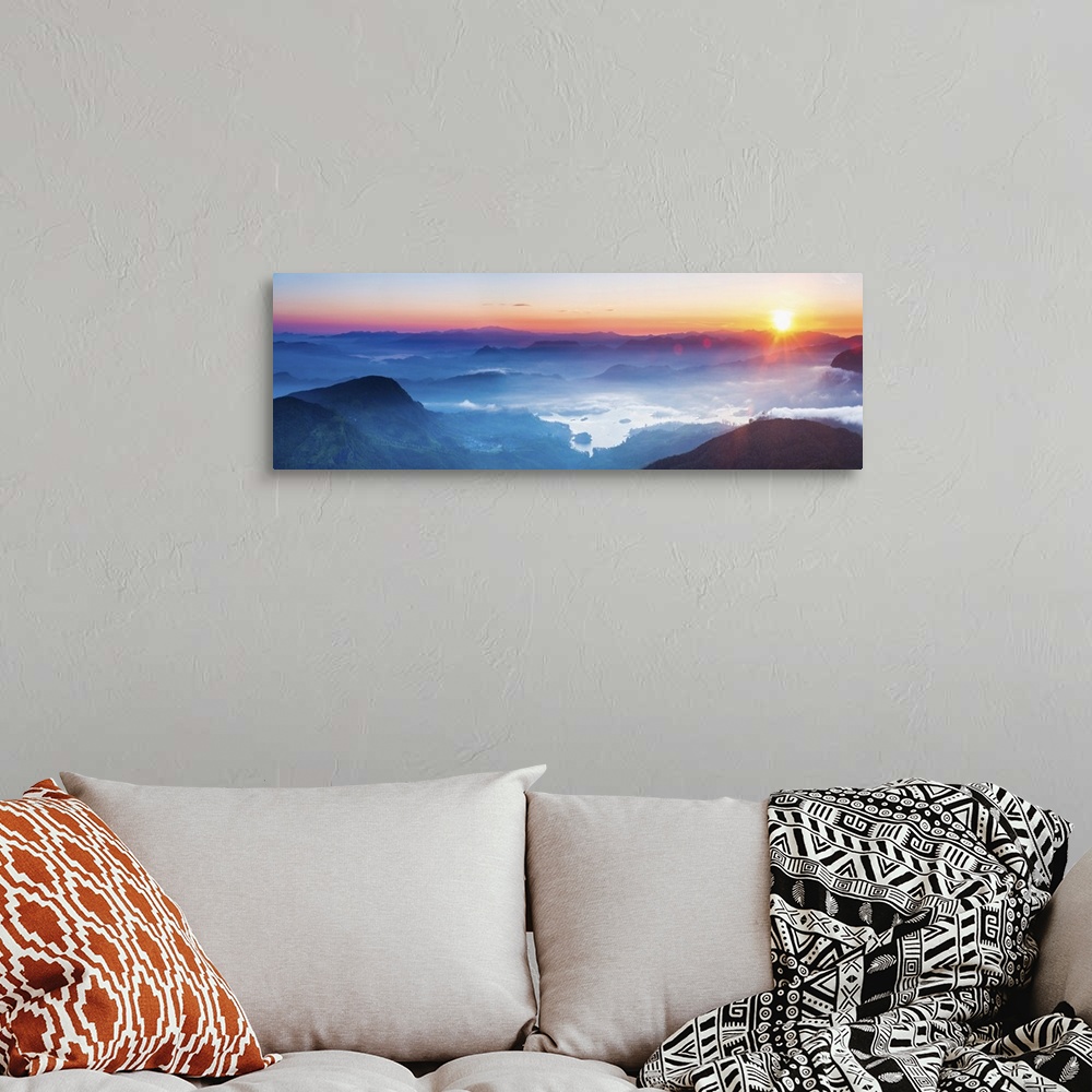 A bohemian room featuring Adams Peak (Sri Pada) view at sunrise, mountains and the Maussakele Reservoir, Central Highlands,...