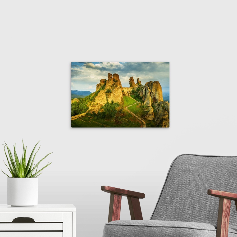 A modern room featuring Aerial view by drone of Kaleto Rock Fortress rock formations, Belogradchik, Bulgaria, Europe