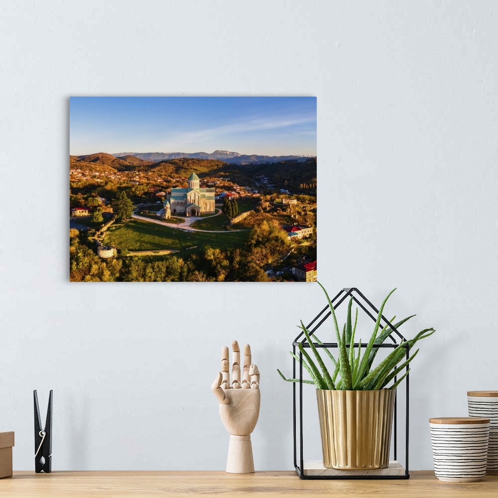 A bohemian room featuring Aerial view of Bagrati Cathedral at sunrise, in Kutaisi, Imereti, Georgia (Sakartvelo), Central A...