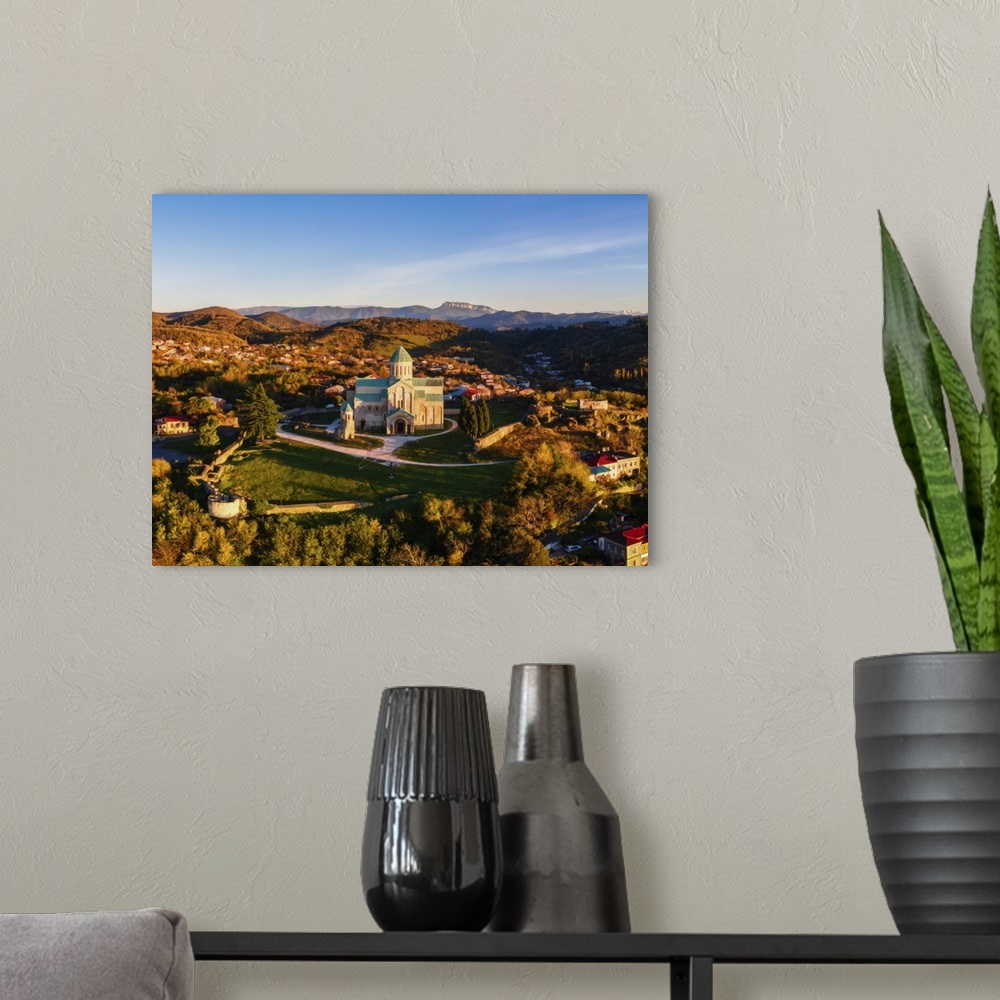 A modern room featuring Aerial view of Bagrati Cathedral at sunrise, in Kutaisi, Imereti, Georgia (Sakartvelo), Central A...