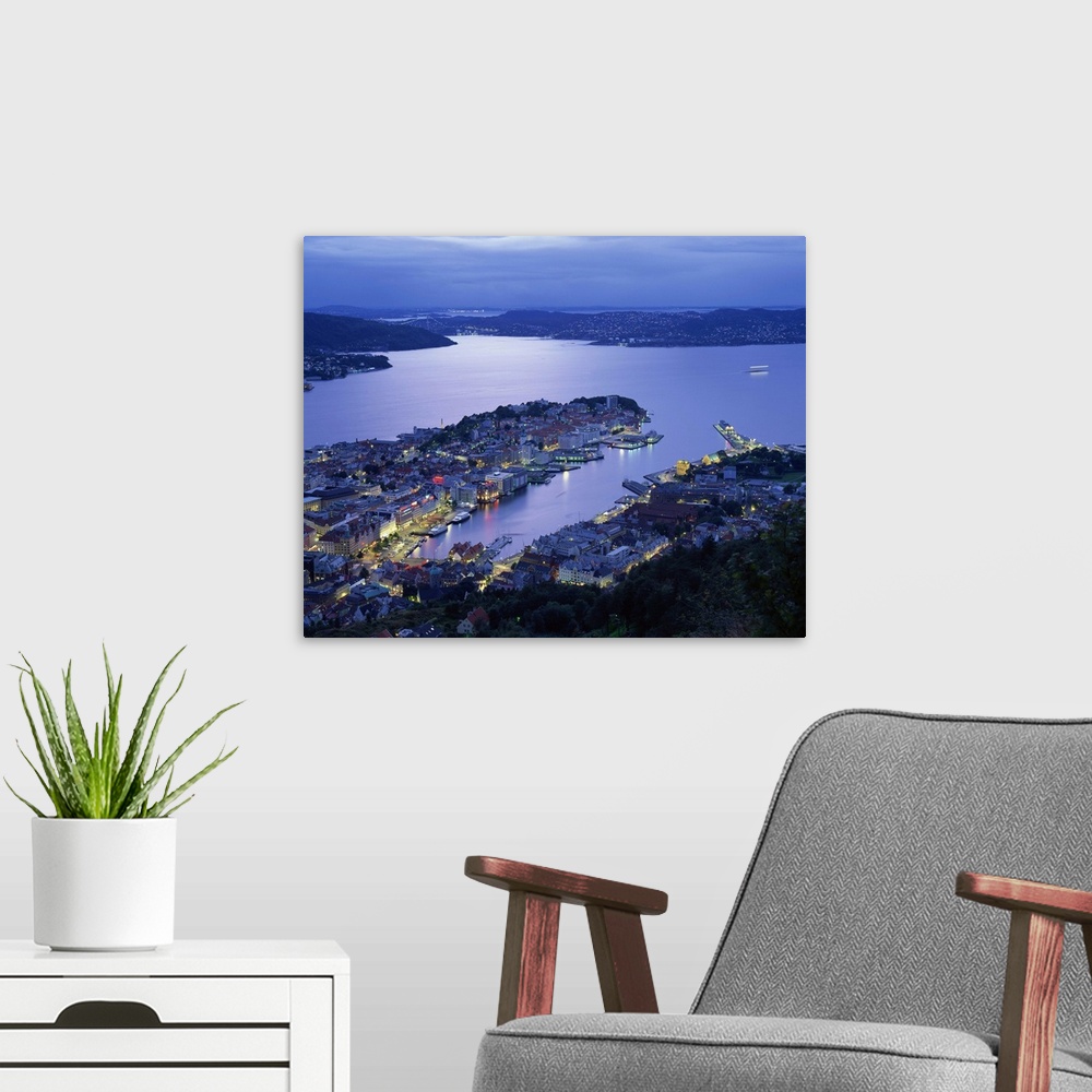 A modern room featuring Aerial view the harbour and city of Bergen at dusk, Norway, Scandinavia