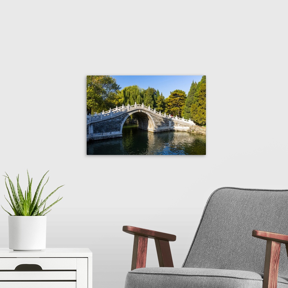 A modern room featuring View of arched bridge on Kunming Lake at Yihe Yuan, The Summer Palace, UNESCO World Heritage Site...