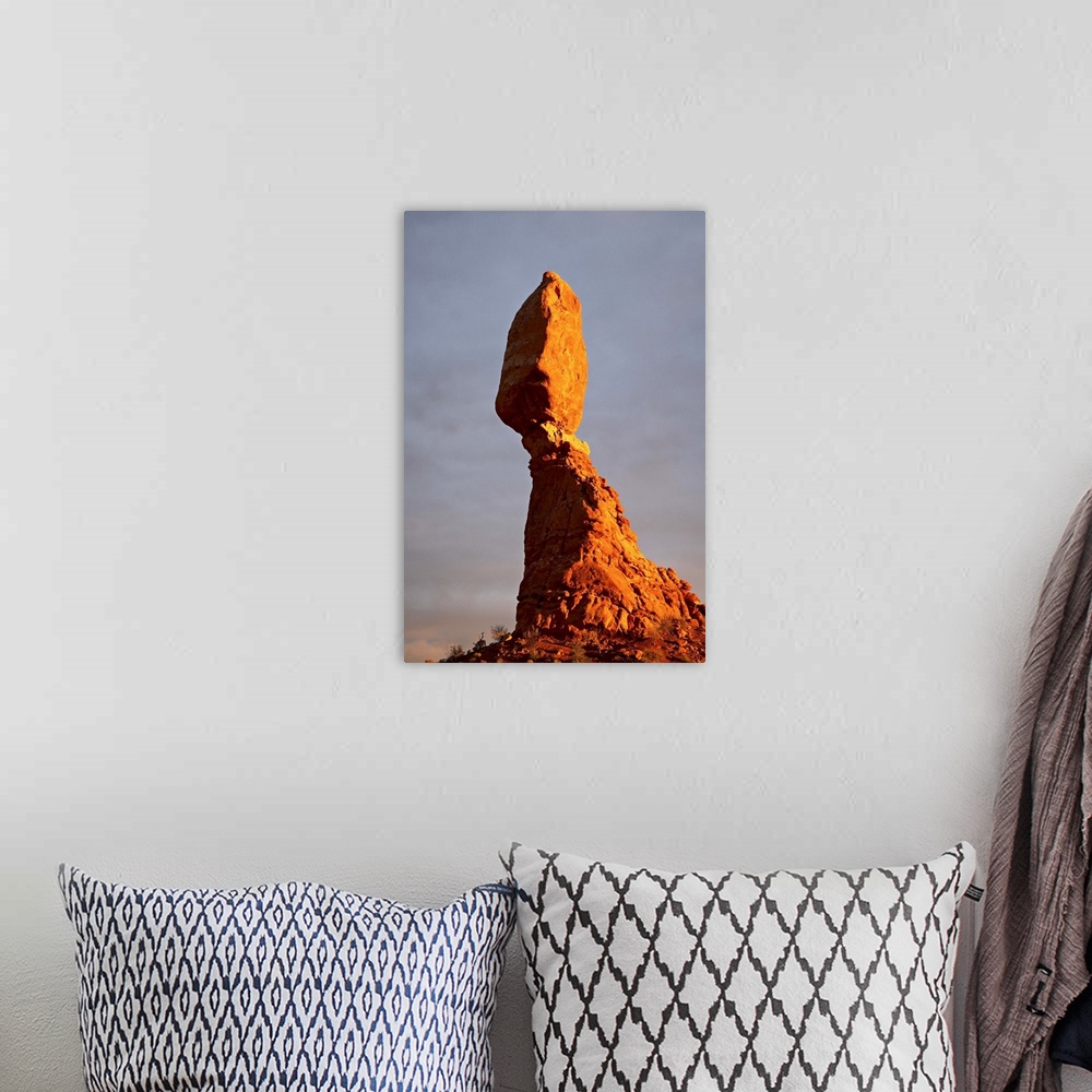 A bohemian room featuring Balanced Rock at sunset, Arches National Park, Utah, USA