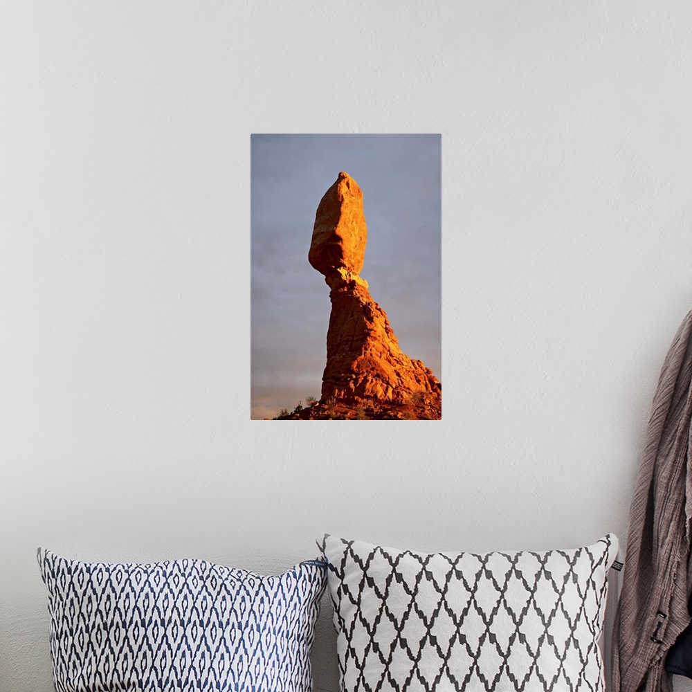 A bohemian room featuring Balanced Rock at sunset, Arches National Park, Utah, USA