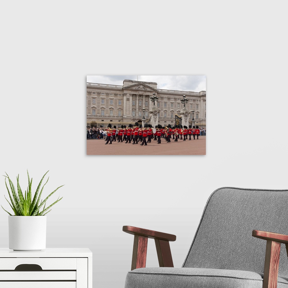 A modern room featuring Band of the Scots Guards lead the procession from Buckingham Palace, London