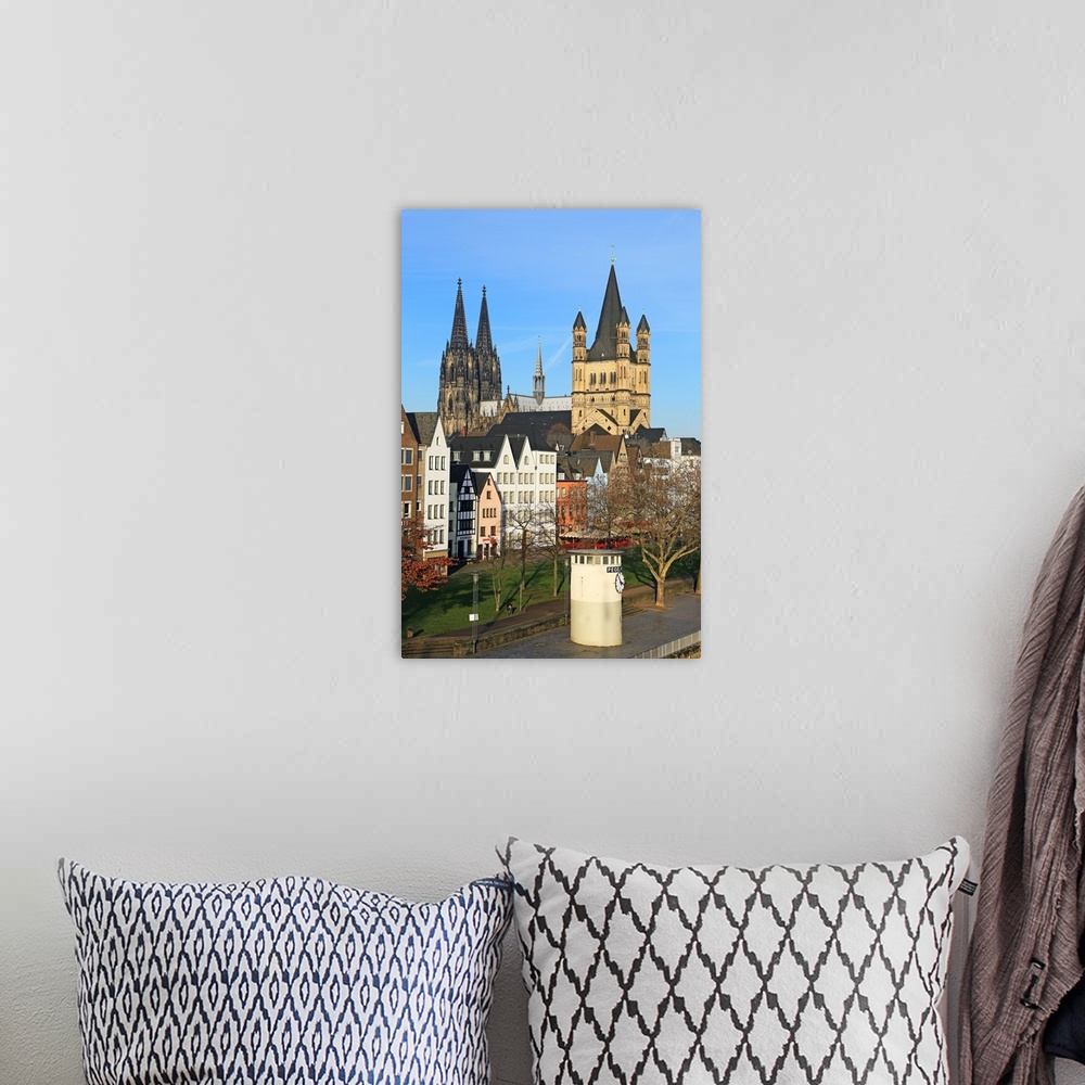 A bohemian room featuring Bank of River Rhine with Gross St. Martin's Church and Cathedral, Cologne, North Rhine-Westphalia...