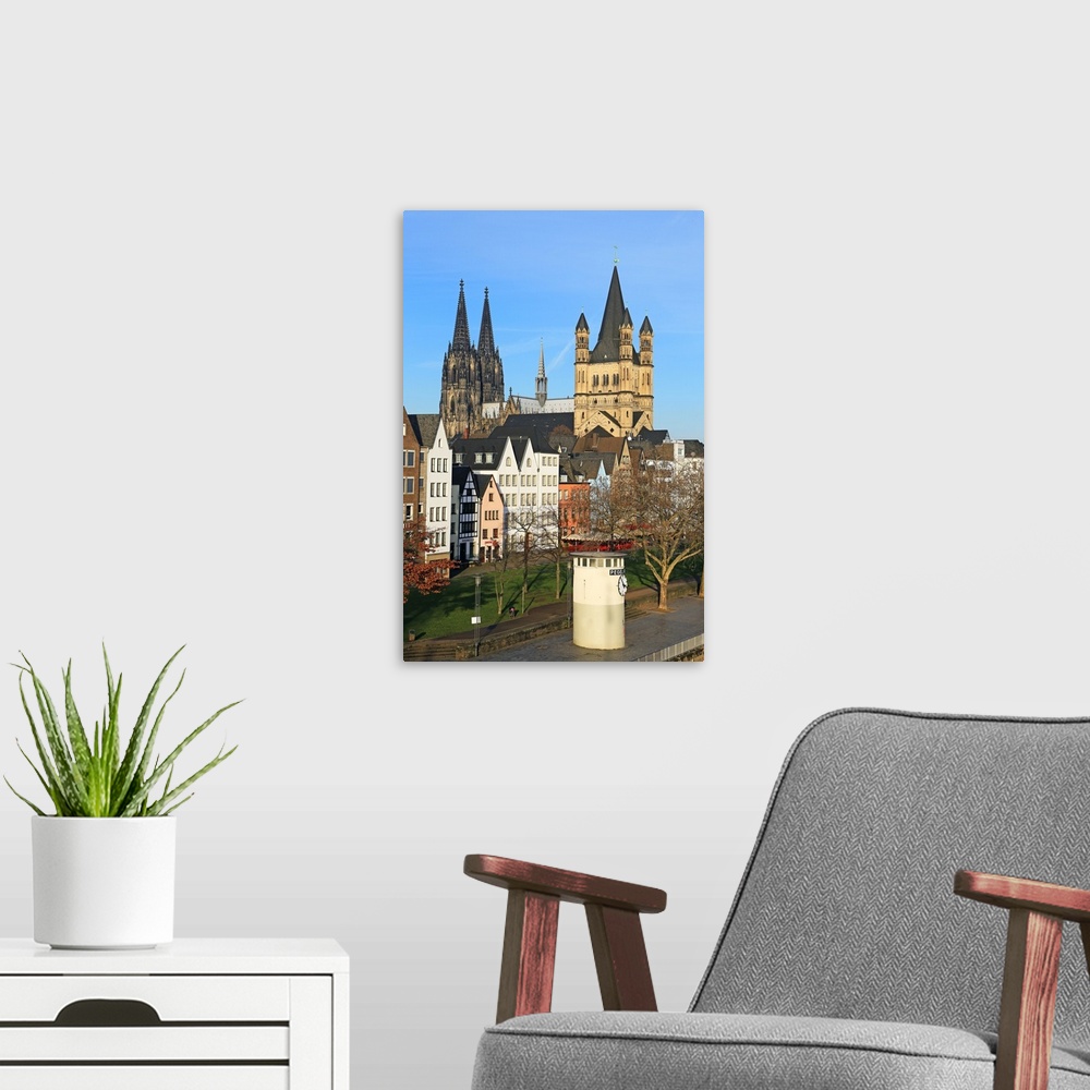 A modern room featuring Bank of River Rhine with Gross St. Martin's Church and Cathedral, Cologne, North Rhine-Westphalia...