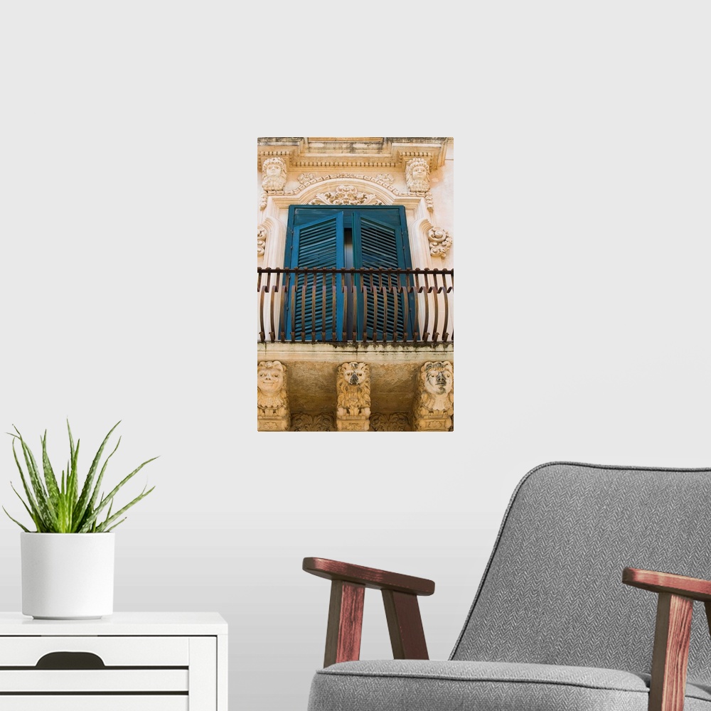 A modern room featuring Baroque balcony, Palazzo Nicolaci, Noto, Sicily, Italy