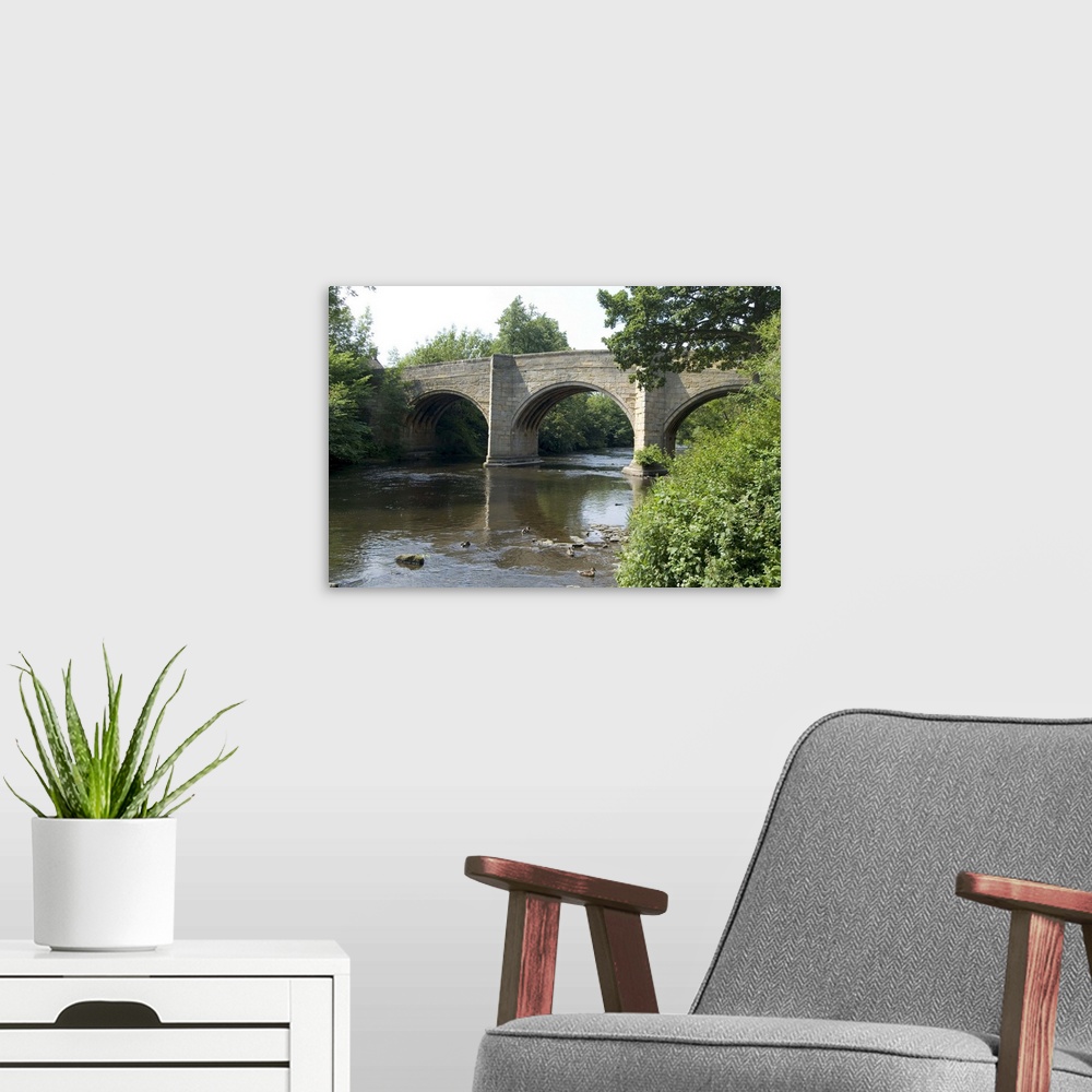 A modern room featuring Baslow Bridge, Derbyshire, Peak District National Park, England, UK
