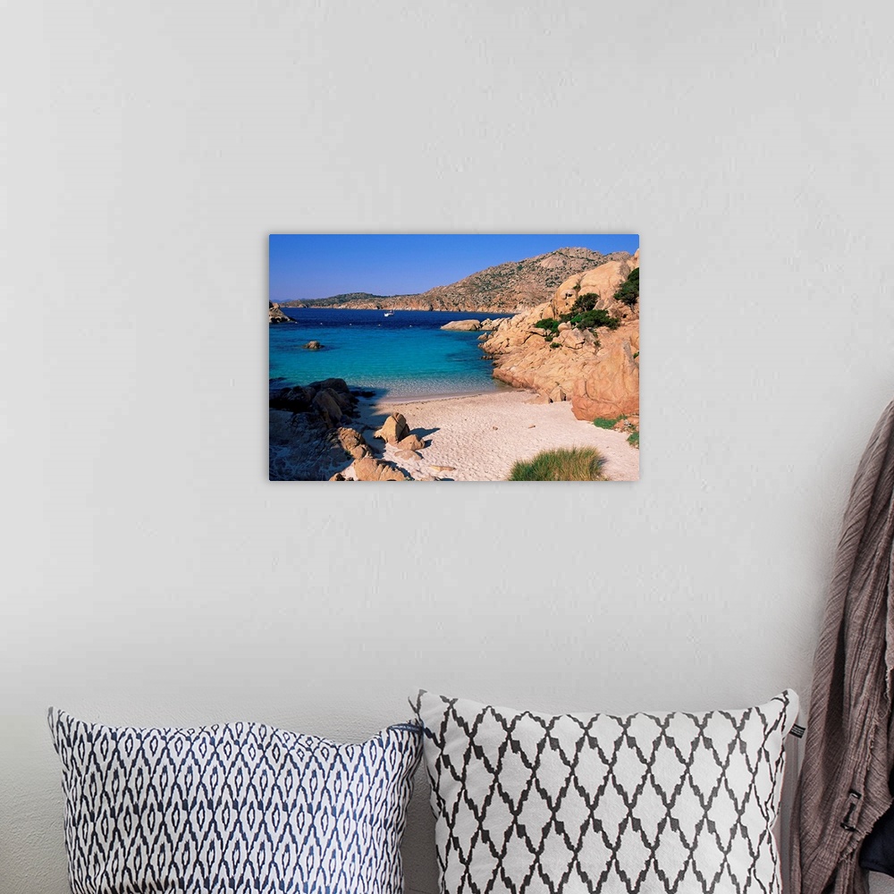 A bohemian room featuring Bay and beach, Cala Coticcio, island of Caprera, La Maddalena Archipelalgo, Sardinia, Italy, Medi...
