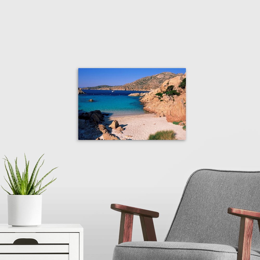 A modern room featuring Bay and beach, Cala Coticcio, island of Caprera, La Maddalena Archipelalgo, Sardinia, Italy, Medi...