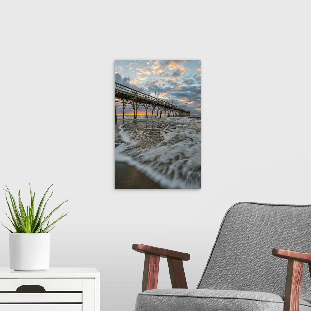 A modern room featuring Beach, ocean, waves and pier at sunrise, Sunset Beach, North Carolina, United States of America, ...