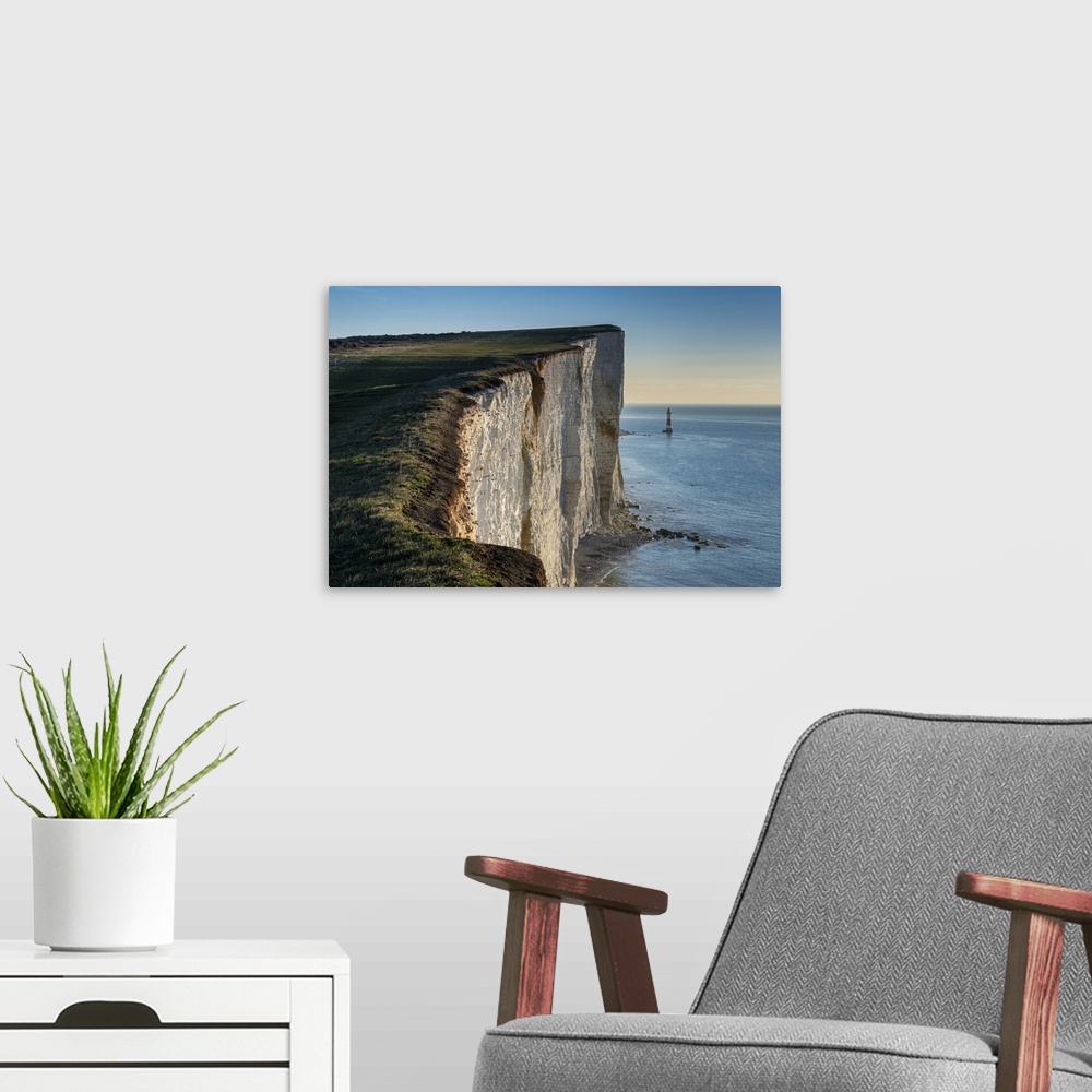 A modern room featuring Beachy Head Lighthouse and the white chalk cliffs of Beachy Head, South Downs National Park, East...