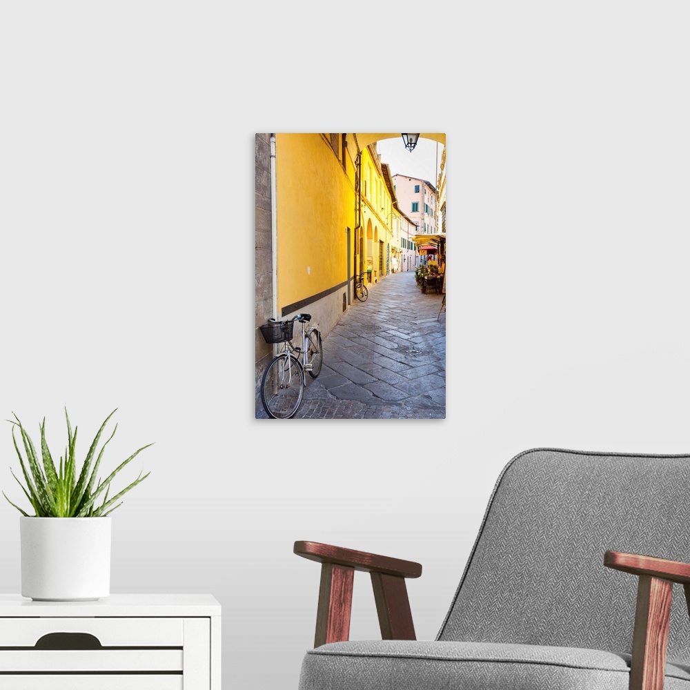 A modern room featuring Bicycle parked at Via Degli Angeli, Lucca, Tuscany, Italy
