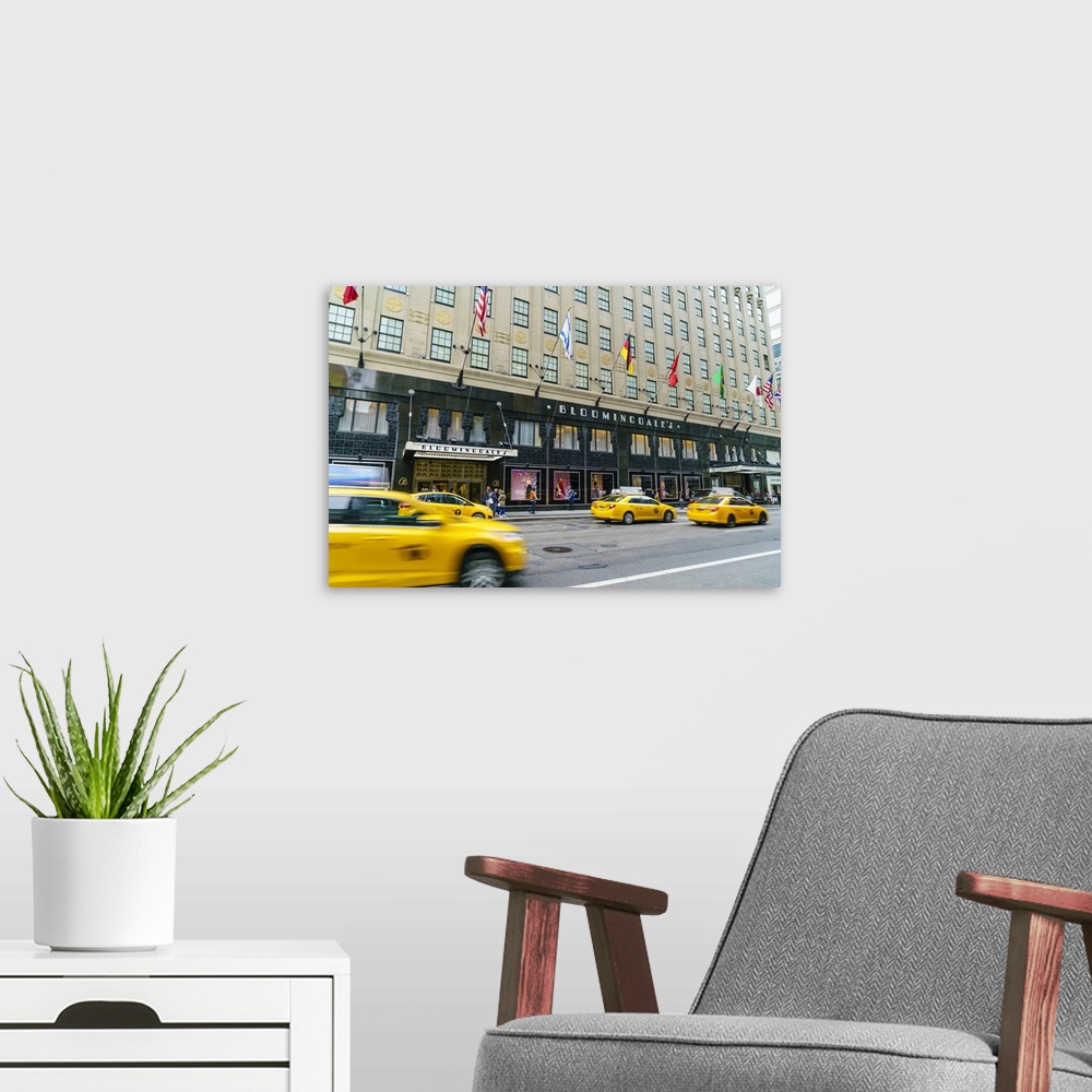 A modern room featuring Bloomingdales Department Store and yellow taxi cabs, Lexington Avenue, Manhattan, New York City, ...
