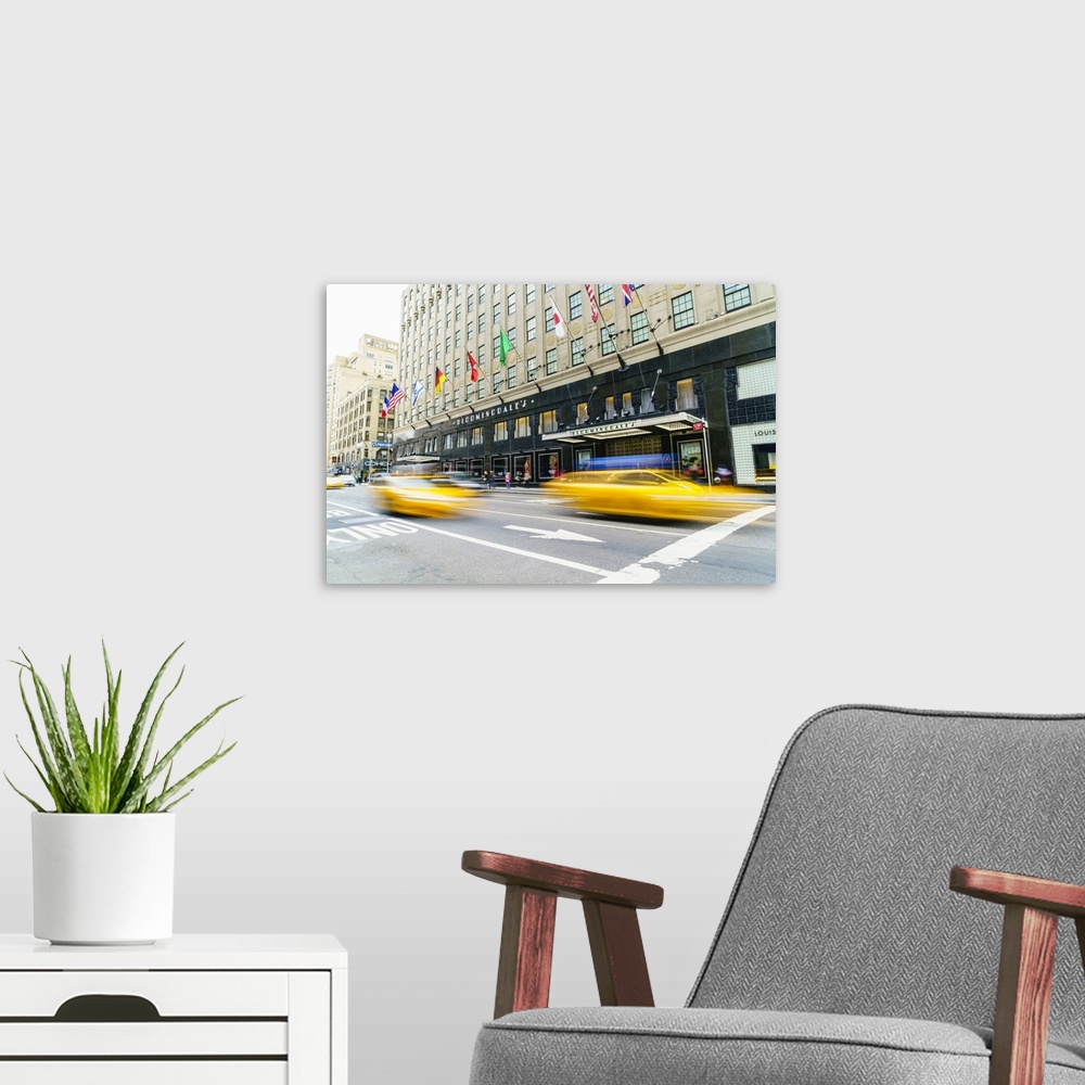 A modern room featuring Bloomingdales Department Store and yellow taxi cabs, Lexington Avenue, Manhattan, New York City, ...