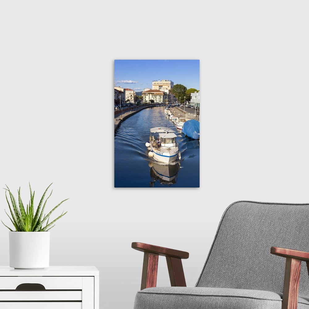 A modern room featuring Boat on the Burlamacca canal, Viareggio, Tuscany, Italy
