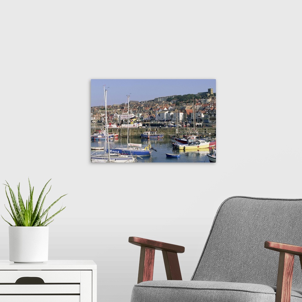 A modern room featuring Boats in harbour and seafront, Scarborough, Yorkshire, England, UK