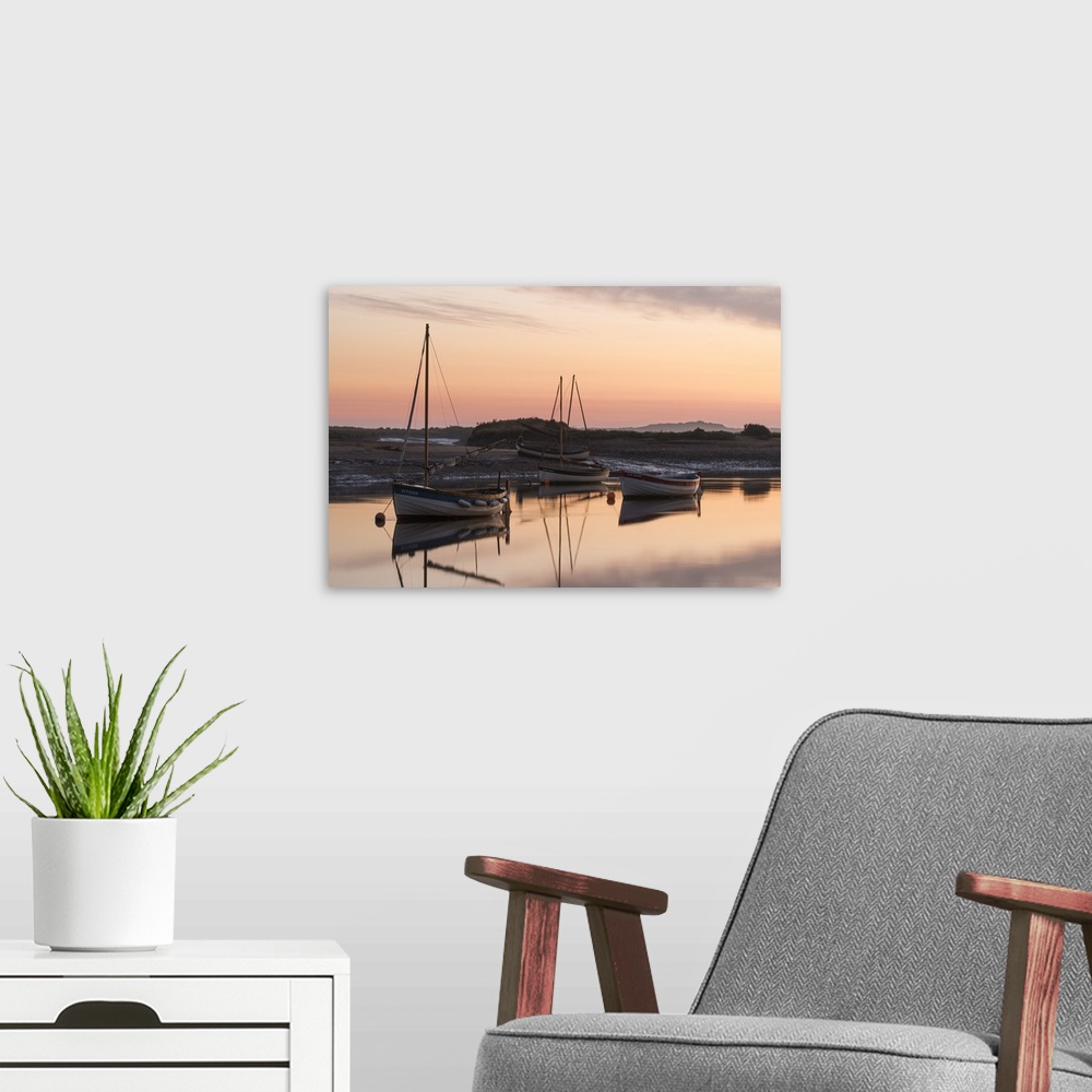A modern room featuring Boats in the channel on a beautiful morning at Burnham Overy Staithe, Norfolk, England