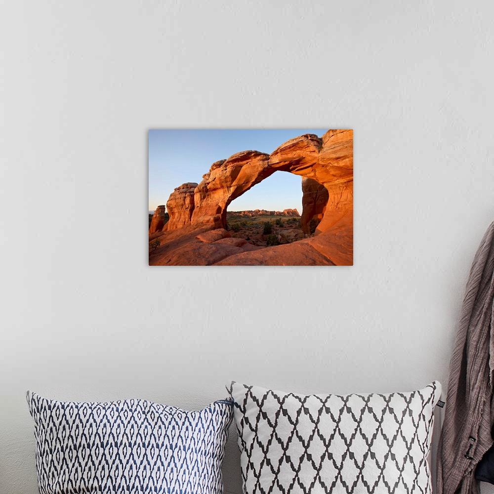 A bohemian room featuring Broken Arch at dawn, Arches National Park, Utah