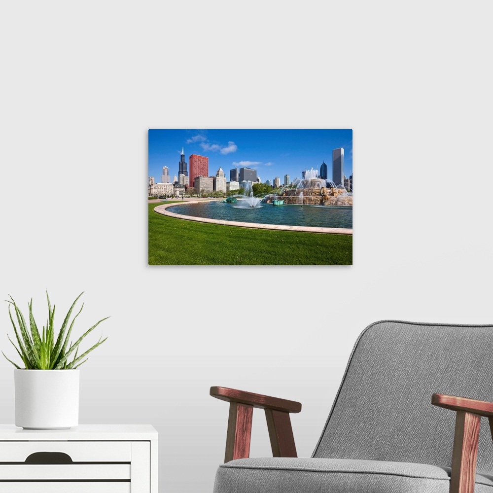 A modern room featuring Buckingham Fountain in Grant Park with Sears Tower, Chicago, Illinois