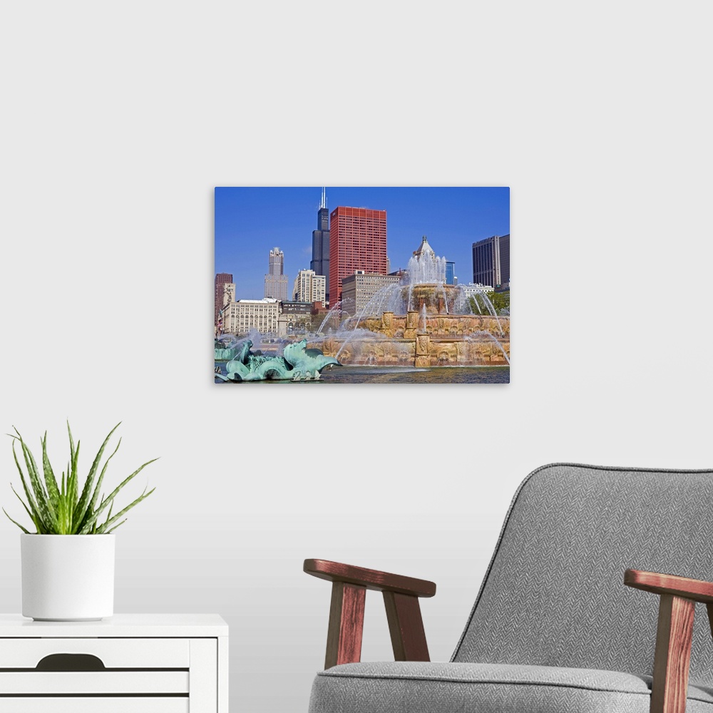 A modern room featuring Buckingham Fountain in Grant Park with Sears Tower, Chicago, Illinois, USA