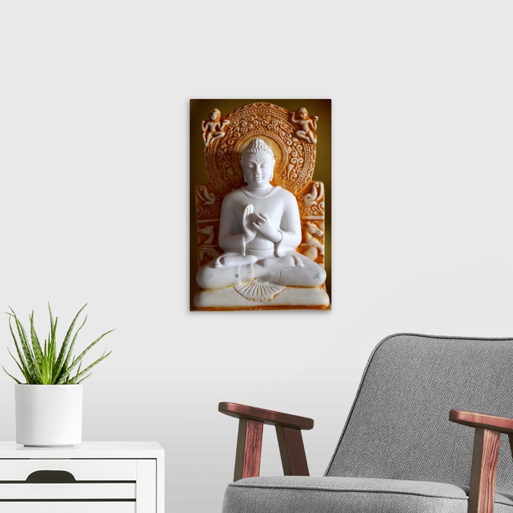 A modern room featuring Buddha statue, Paris, France, Europe