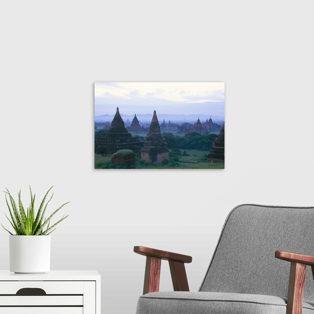 A modern room featuring Buddhist temples at dawn, Bagan (Pagan) archaeological site, Myanmar (Burma)