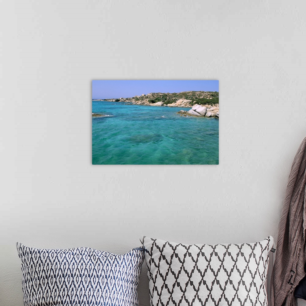 A bohemian room featuring Cala Serena, island of Caprera, Sardinia, Italy