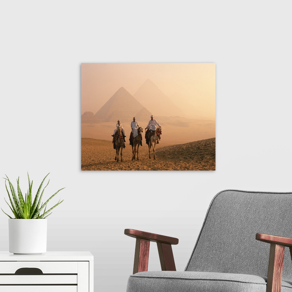 A modern room featuring Camel riders at Giza Pyramids, Giza, Cairo, Egypt, Africa