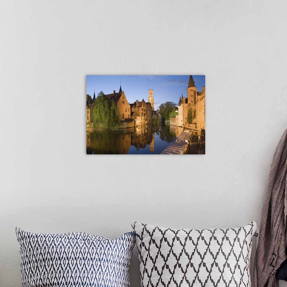A bohemian room featuring Canal and Belfry Tower in the evening, Bruges, Belgium