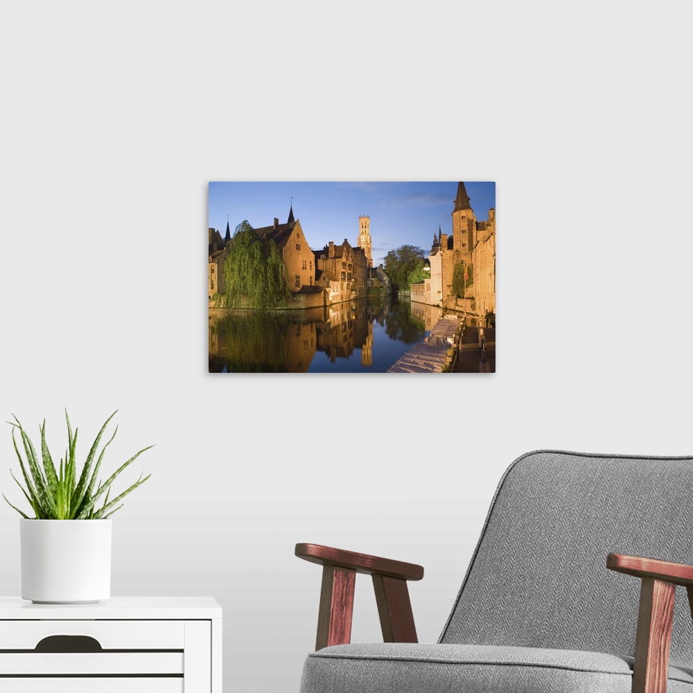 A modern room featuring Canal and Belfry Tower in the evening, Bruges, Belgium