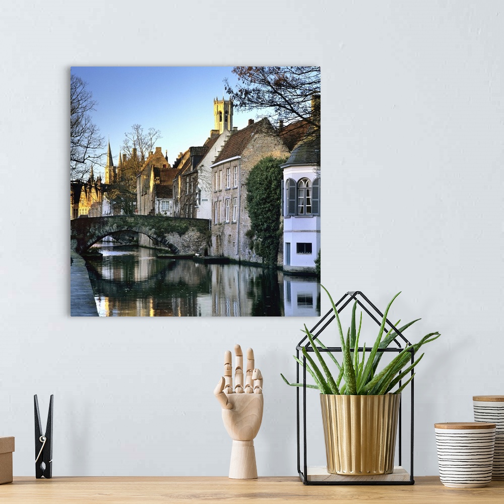 A bohemian room featuring Canal view with Belfry in winter, Bruges, West Vlaanderen (Flanders), Belgium