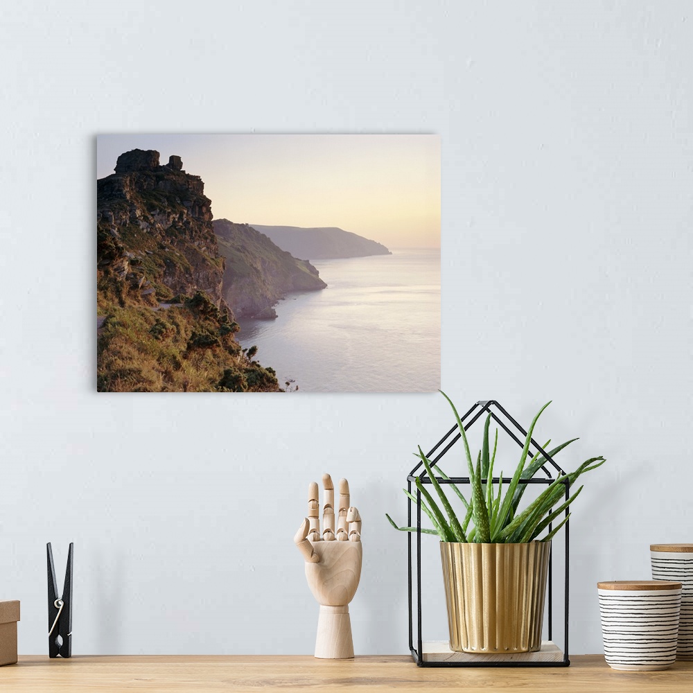 A bohemian room featuring Castle Rock on the coast overlooking Wringcliff Bay, Devon, England