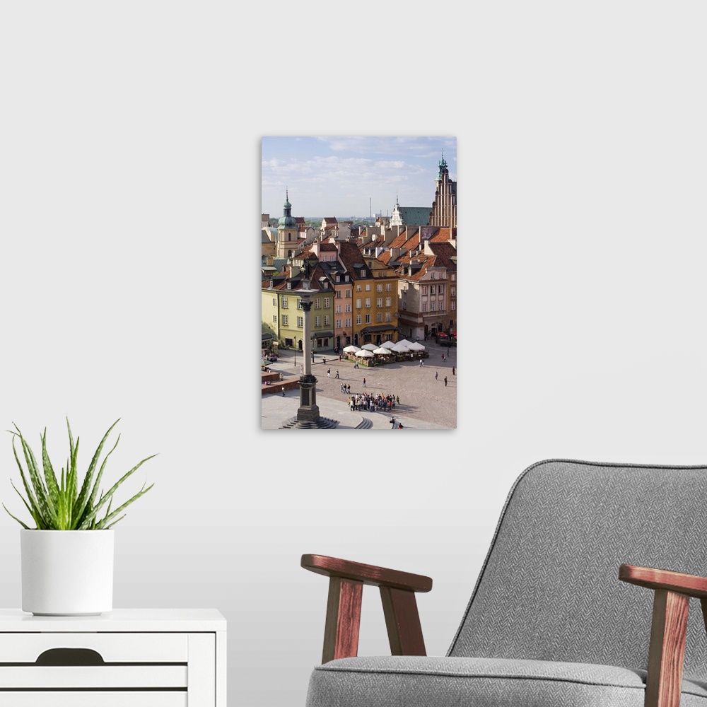 A modern room featuring Castle Square and colourful houses of the Old Town, Warsaw, Poland