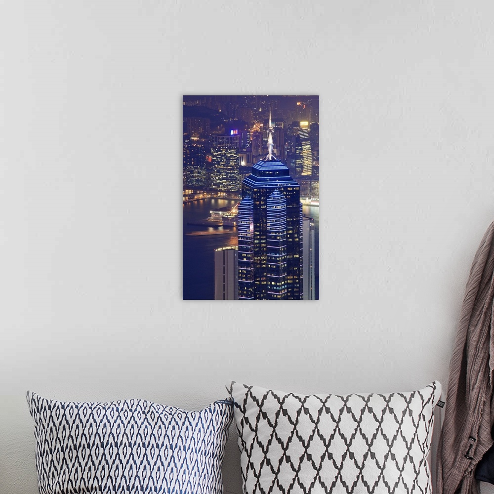 A bohemian room featuring Central skyscrapers at night, Hong Kong, China, Asia