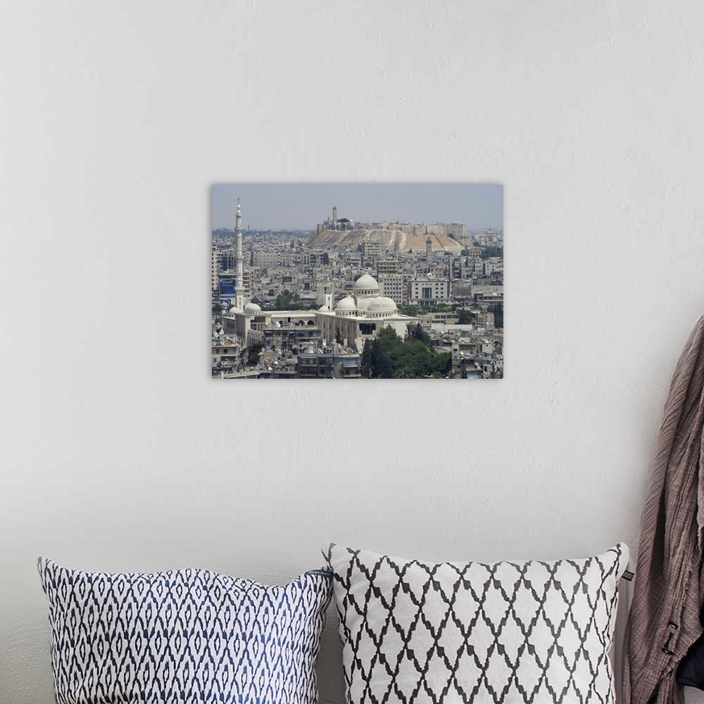 A bohemian room featuring City mosque and the Citadel, Aleppo, Syria