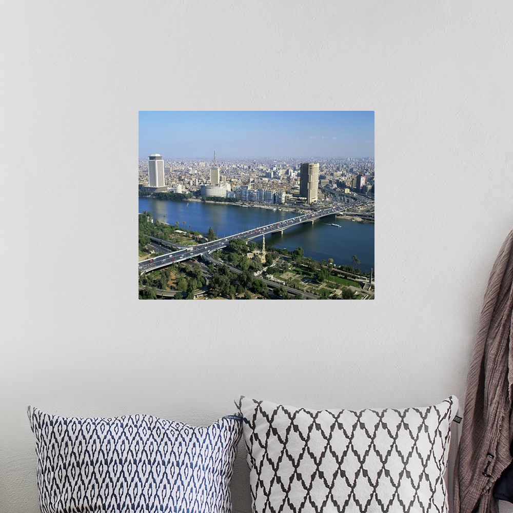 A bohemian room featuring City skyline with the 6th October Bridge over the River Nile, Cairo, Egypt, Africa
