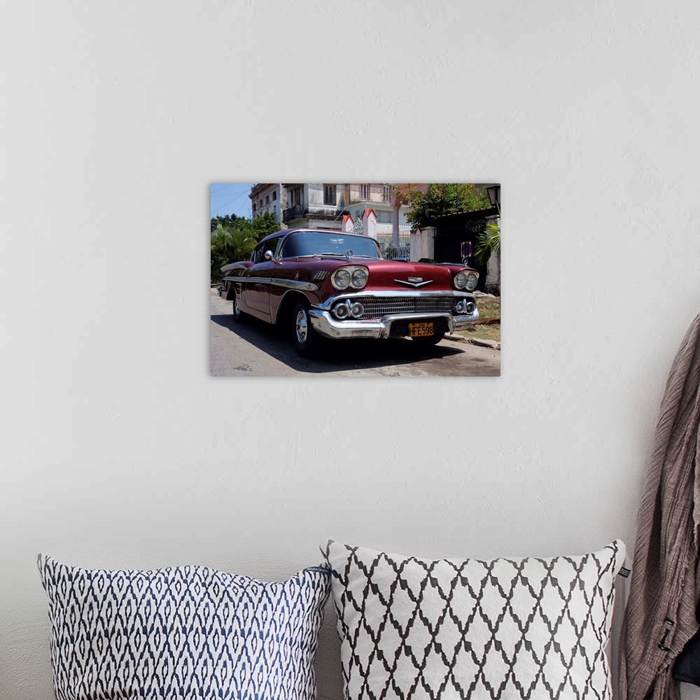 A bohemian room featuring Classic Chevrolet Impala saloon car, Vedado, Havana, Cuba, West Indies