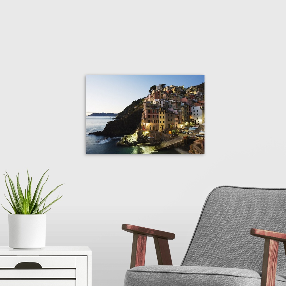 A modern room featuring Clifftop village of Riomaggiore, Cinque Terre, Liguria, Italy