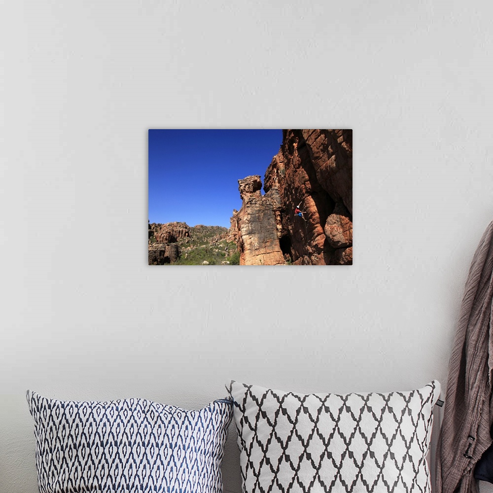 A bohemian room featuring Climber on cliffs in the Cederberg mountains, Western Cape