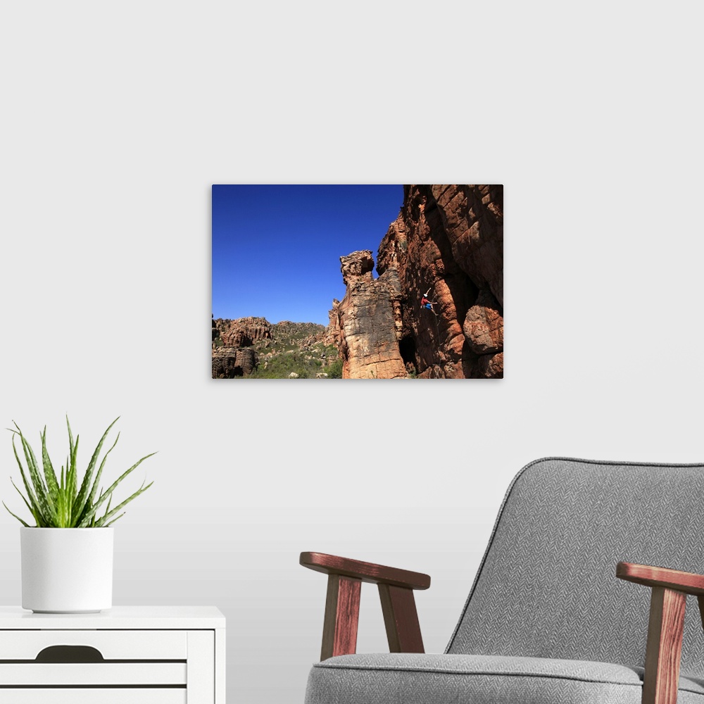 A modern room featuring Climber on cliffs in the Cederberg mountains, Western Cape
