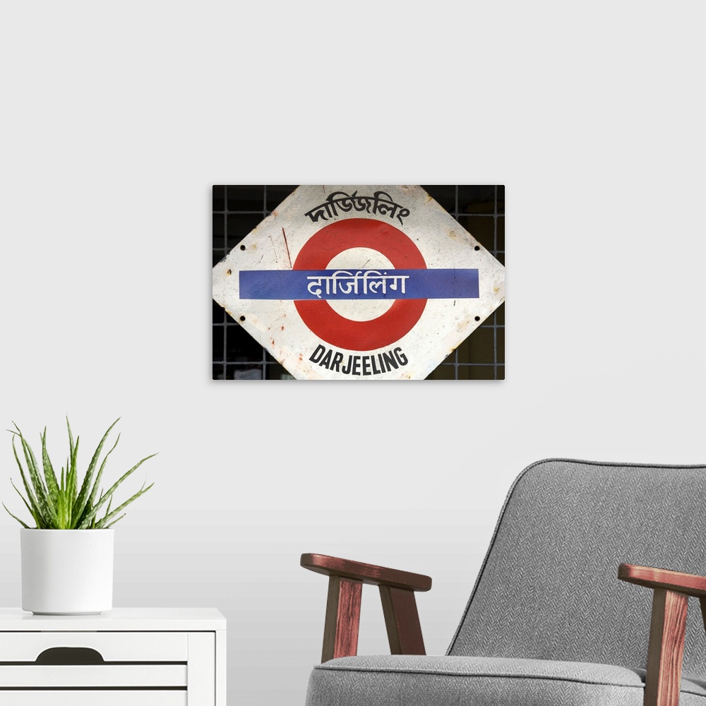 A modern room featuring Close up of a British style station sign at train station, Darjeeling, India