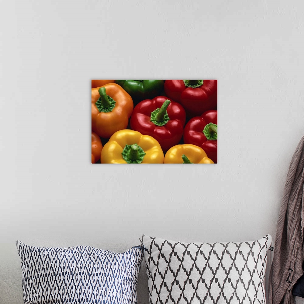 A bohemian room featuring Close-up of yellow, red, orange and green peppers